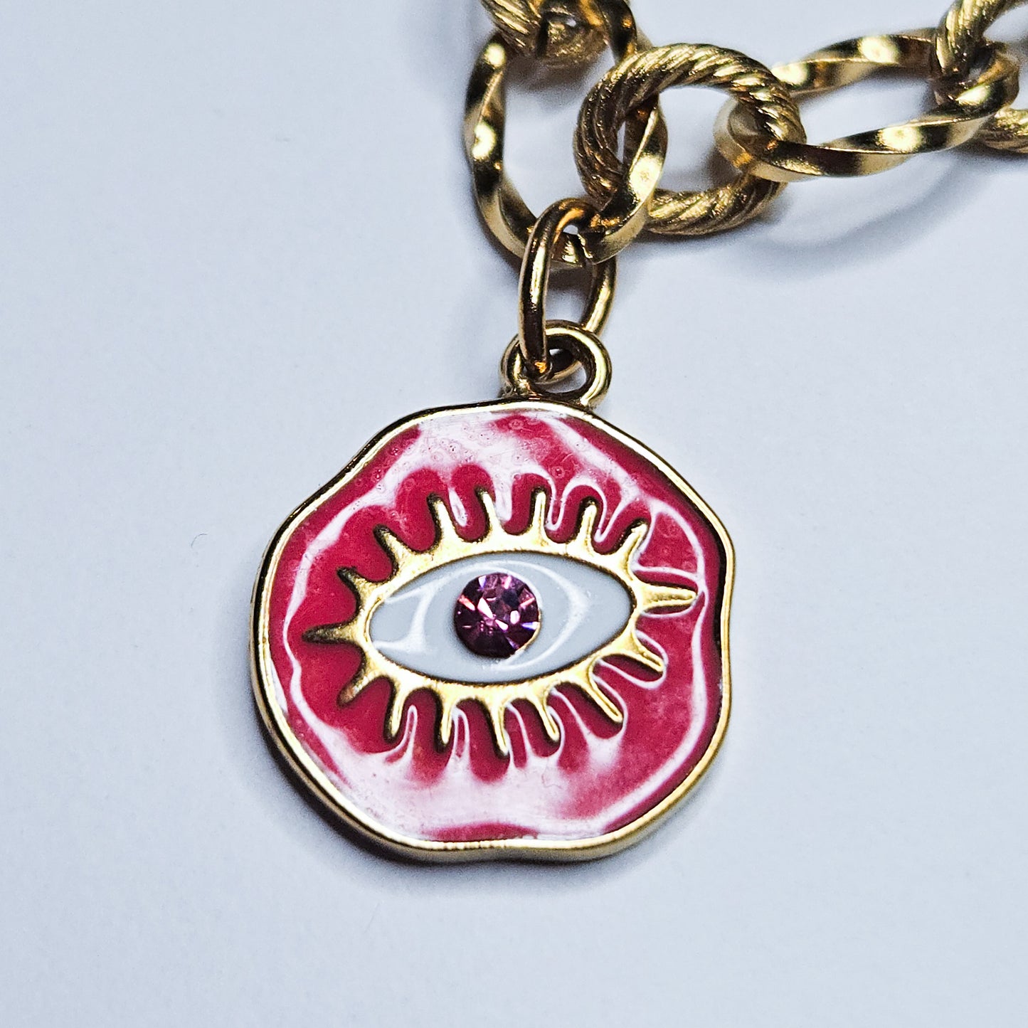 Collier breloques oeil de protection Yris framboise