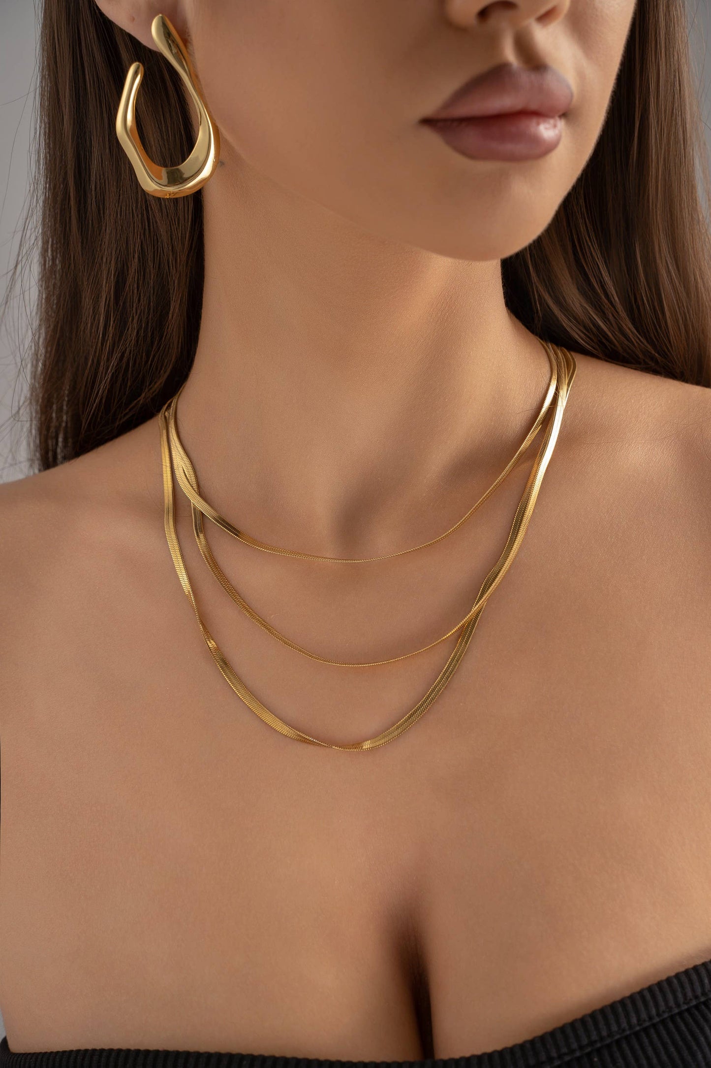 Elegance Trio Necklace – Multi-Strand Stainless Steel: Yellow gold