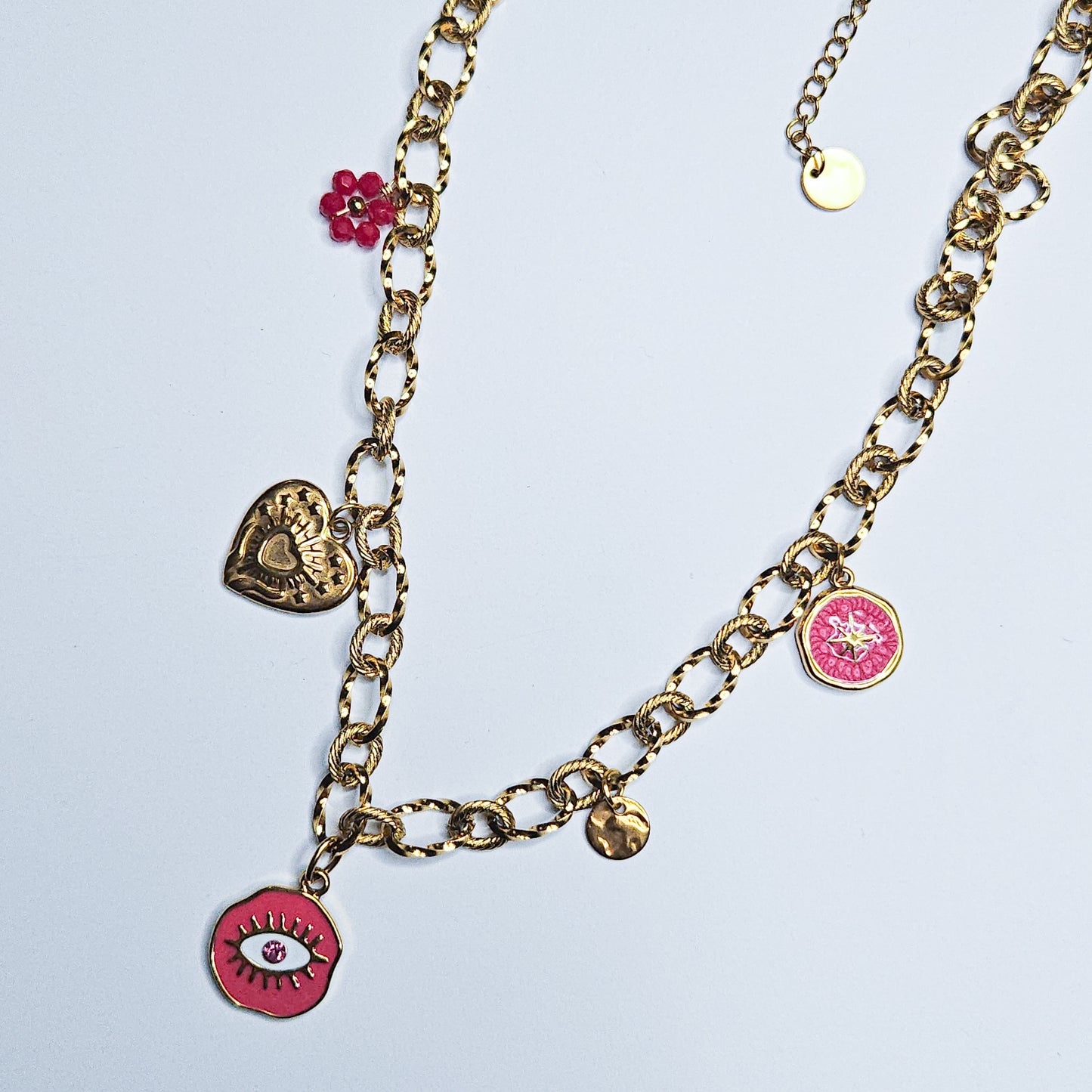 Collier breloques oeil de protection Yris framboise