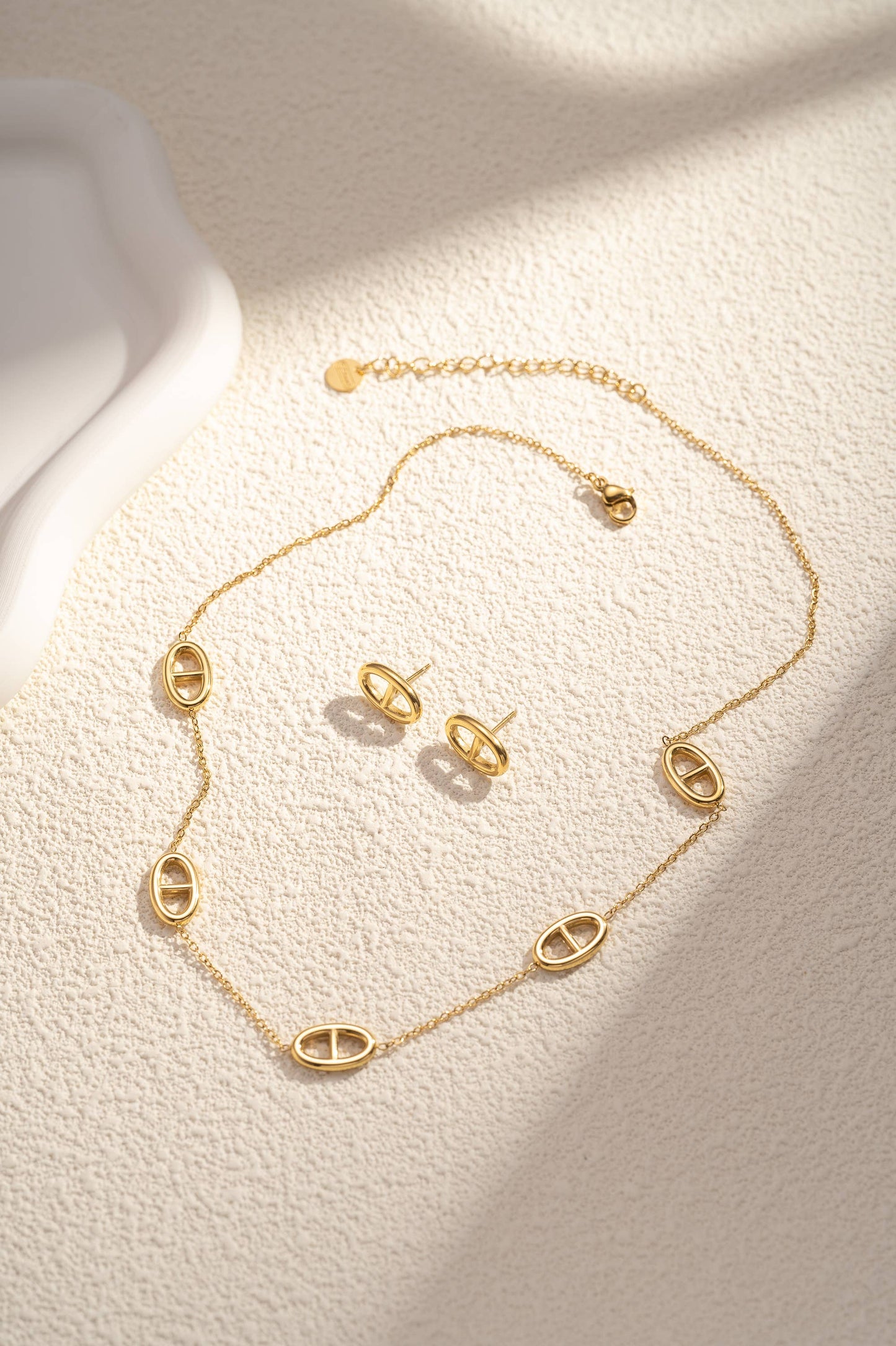 Oval pattern necklace and earring set in stainless steel