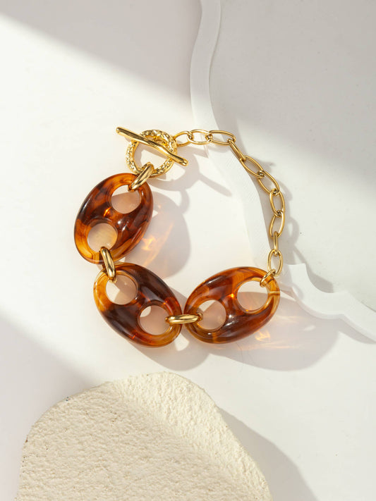 Gold chain bracelet with oval links in steel and resin: Brown