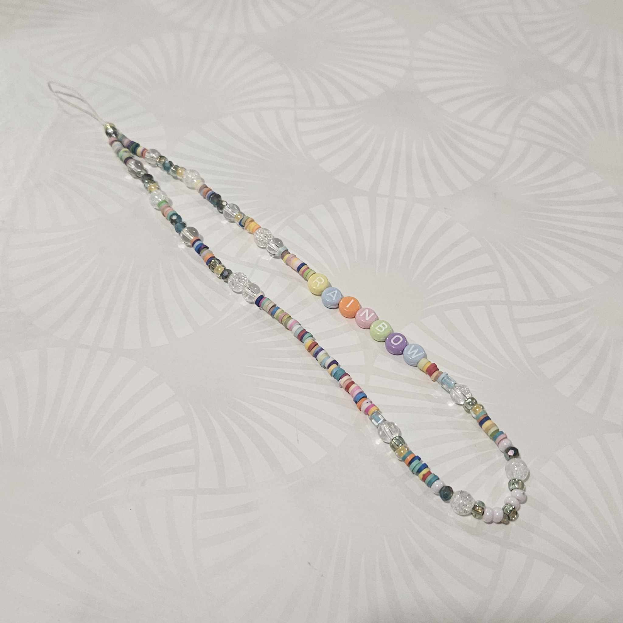 Cordon de téléphone RAINBOW avec pierres cristal de roche